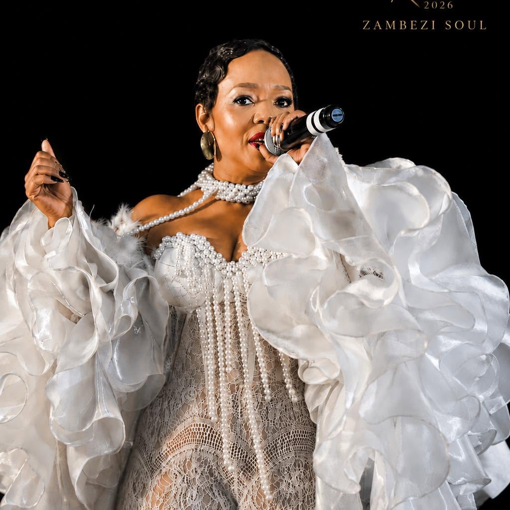 Kearoma Rantao - Performing in a white pearl-trimmed gown